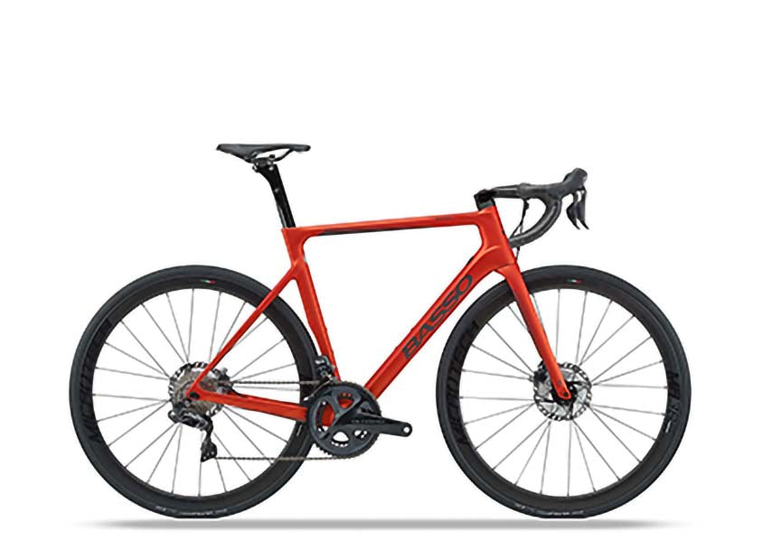 A red Basso Astra Disc Carbon road bike with hydraulic disc brakes and a Shimano Ultegra drivetrain.